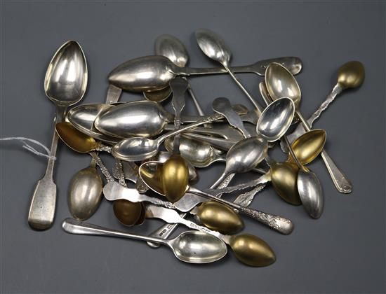 A set of twelver parcel gilt sterling coffee spoons, a set of six silver teaspoons and twelve other silver teaspoons. 11.5 oz.